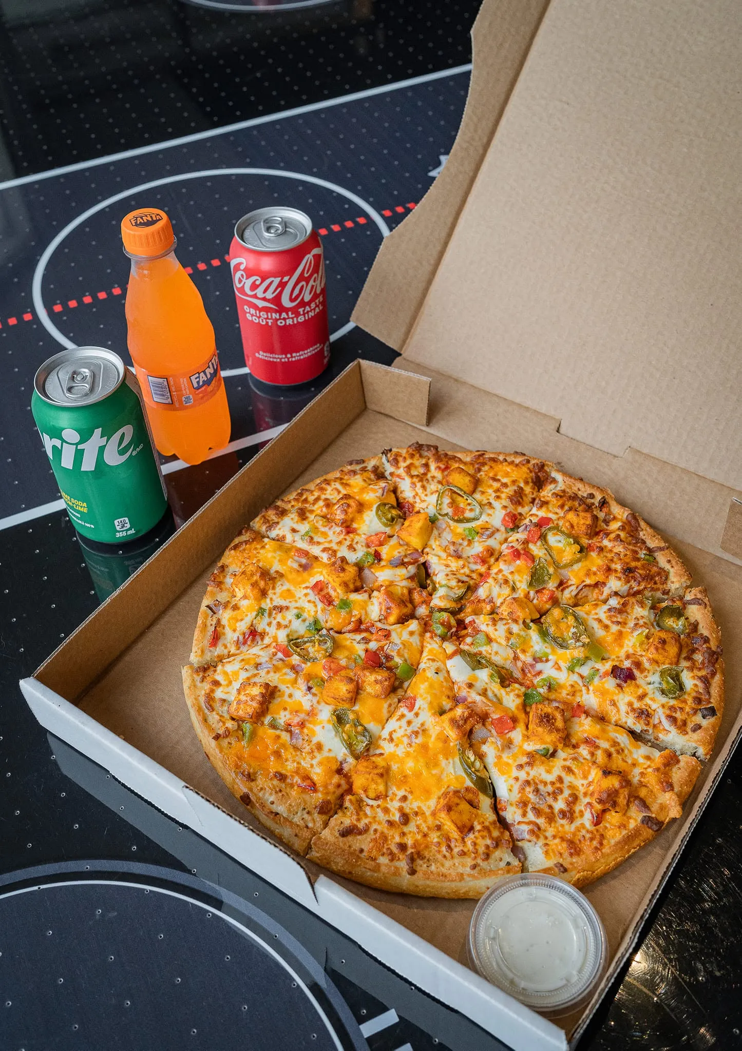 Meat Lovers and Philly Cheesesteak pizza at Next Level Pizza, Medicine Hat